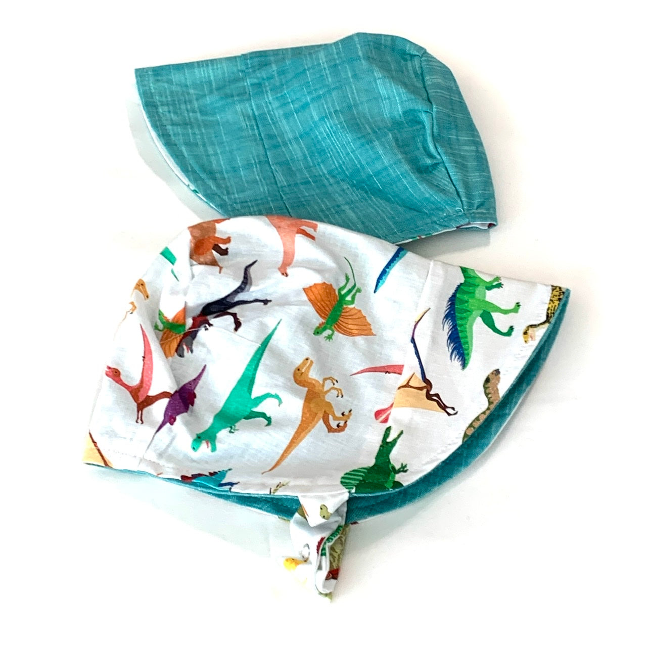 Bonnet in Dinosaurus by UB2 | Urban Baby Bonnets