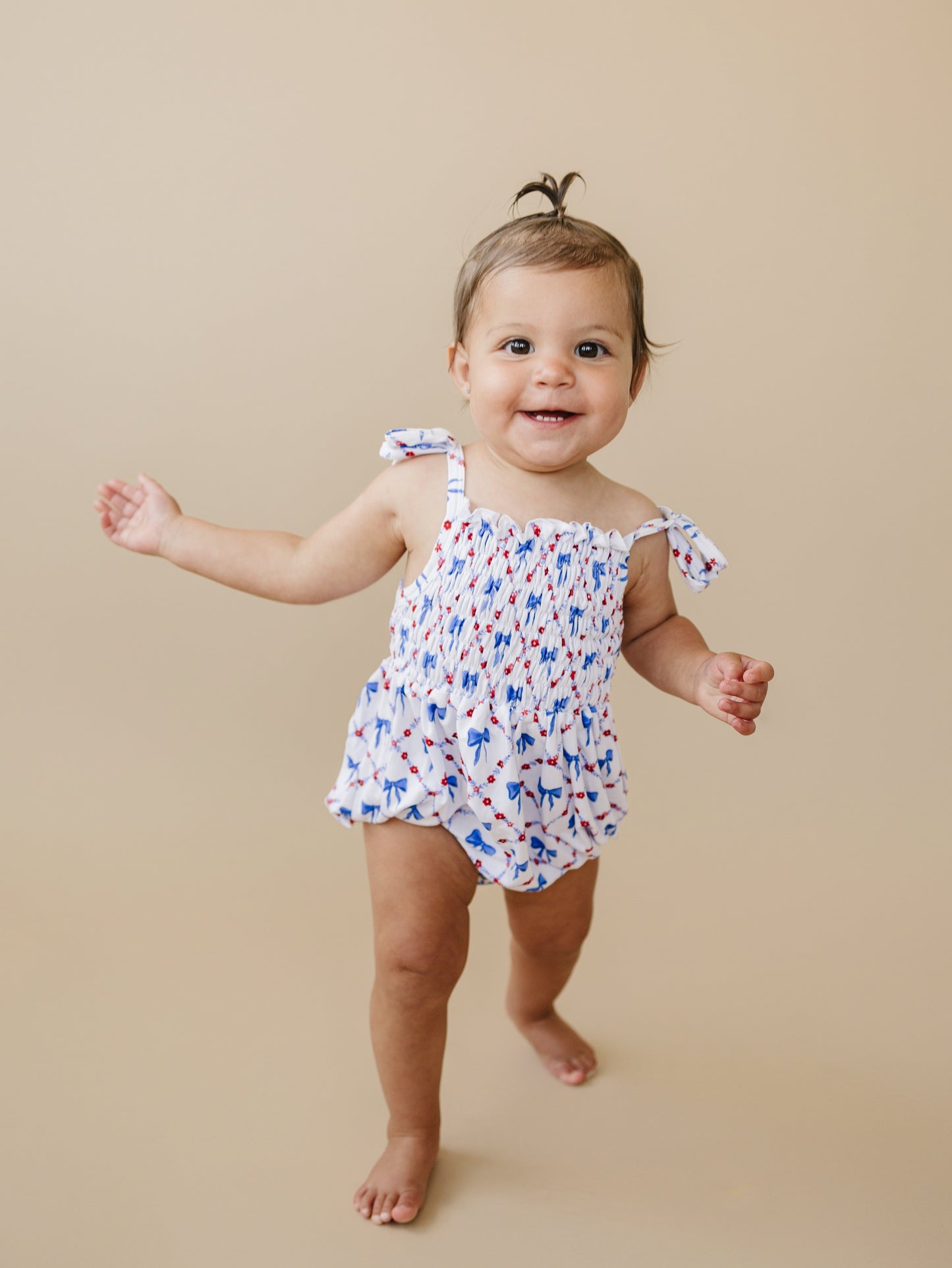 Smocked Red, White and Bows Bamboo Bubble Romper by Little Joy Co.