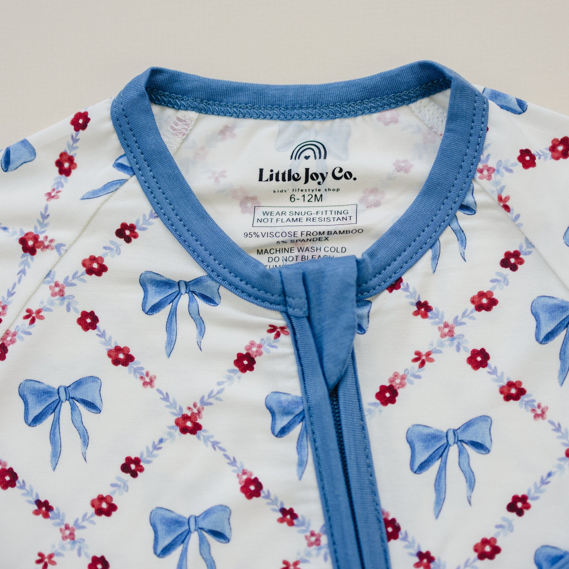 Red White & Bows Bamboo Zippy Pajamas by Little Joy Co., product view 2