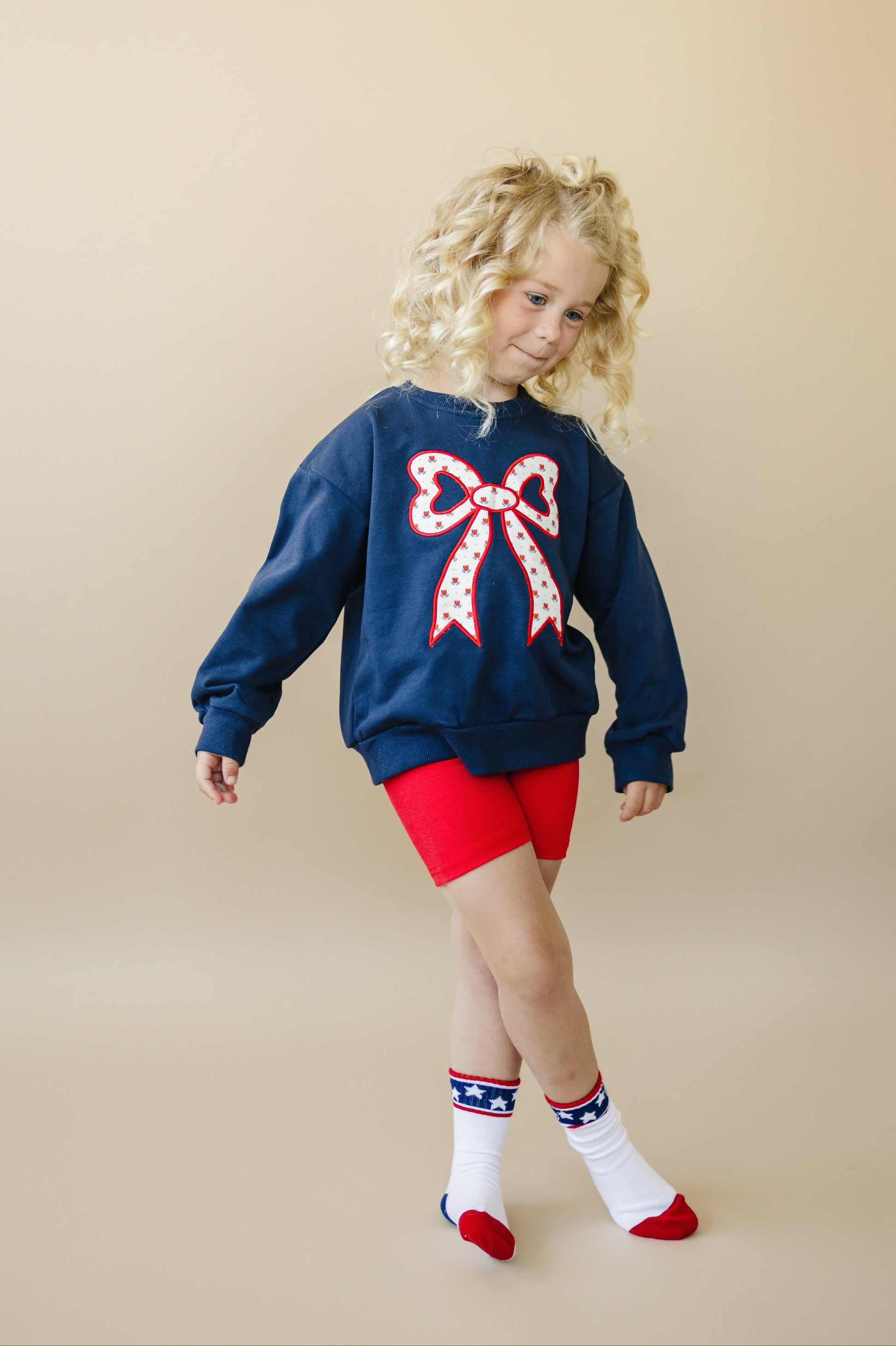 Tulip Bow Applique Crewneck Sweatshirt by Little Joy Co.