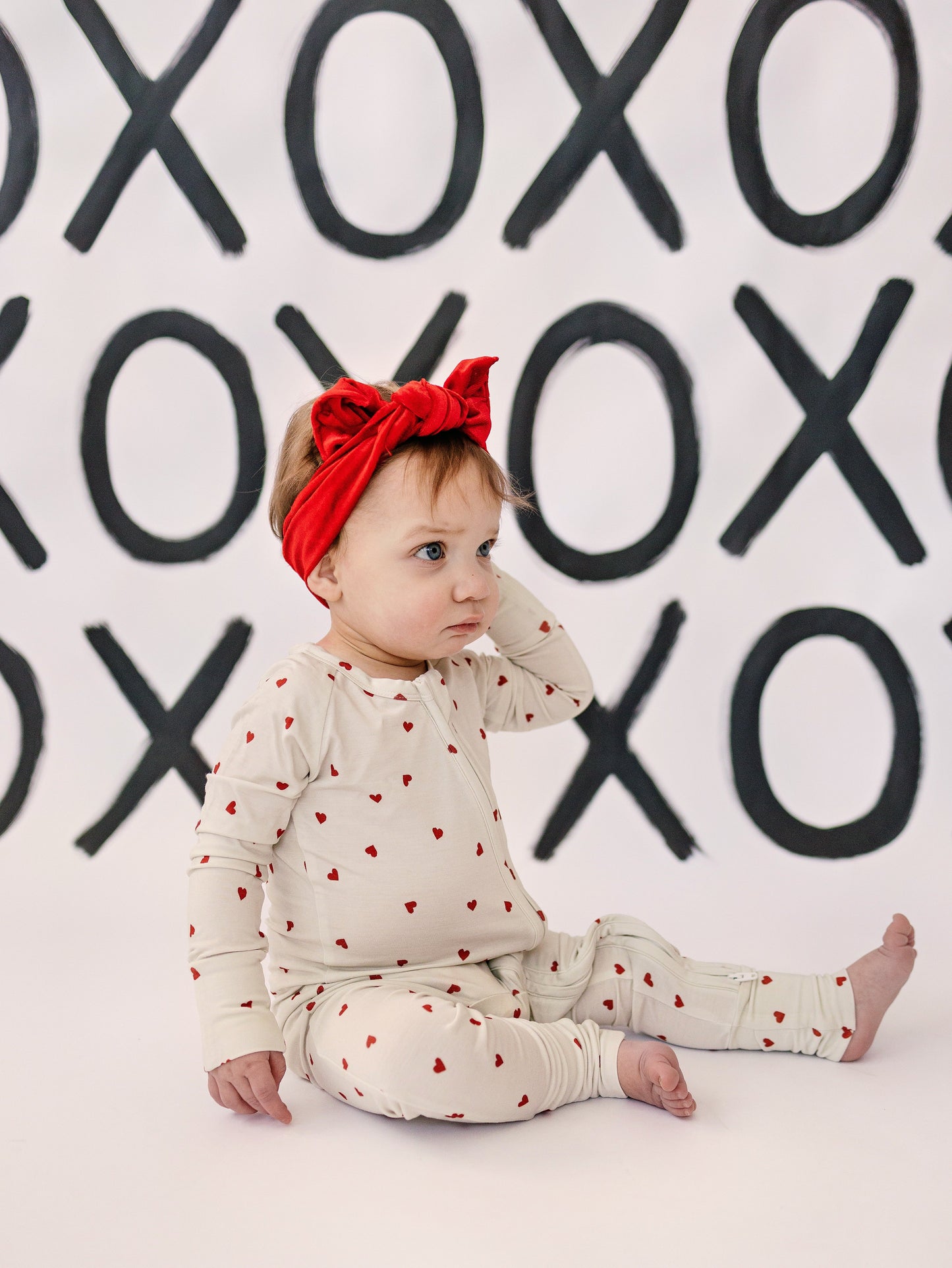 Tiny Hearts Bamboo Zippy Pajamas by Little Joy Co.