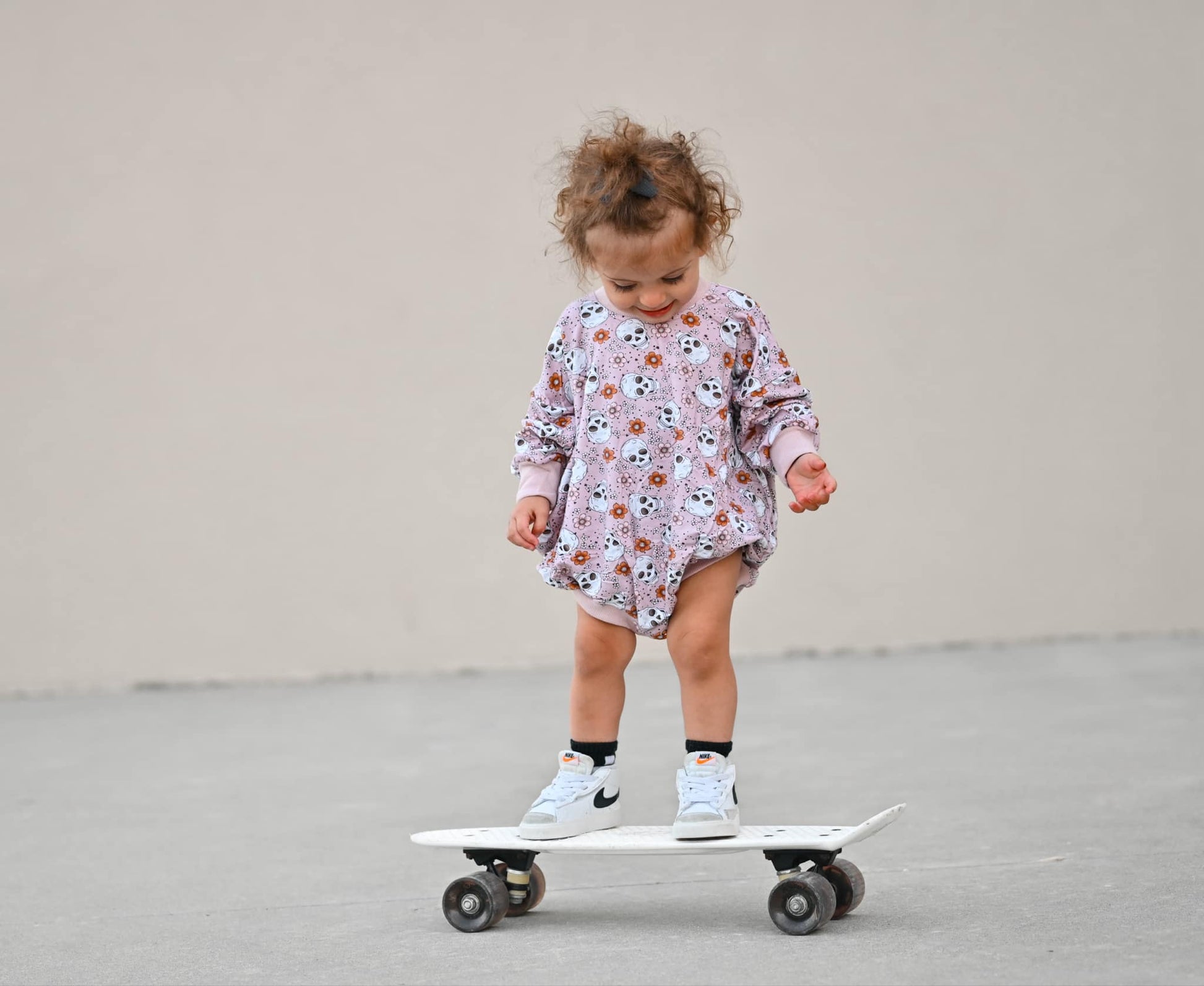 Purple Floral Skulls Bamboo Bubble Romper by Little Joy Co., product view 3
