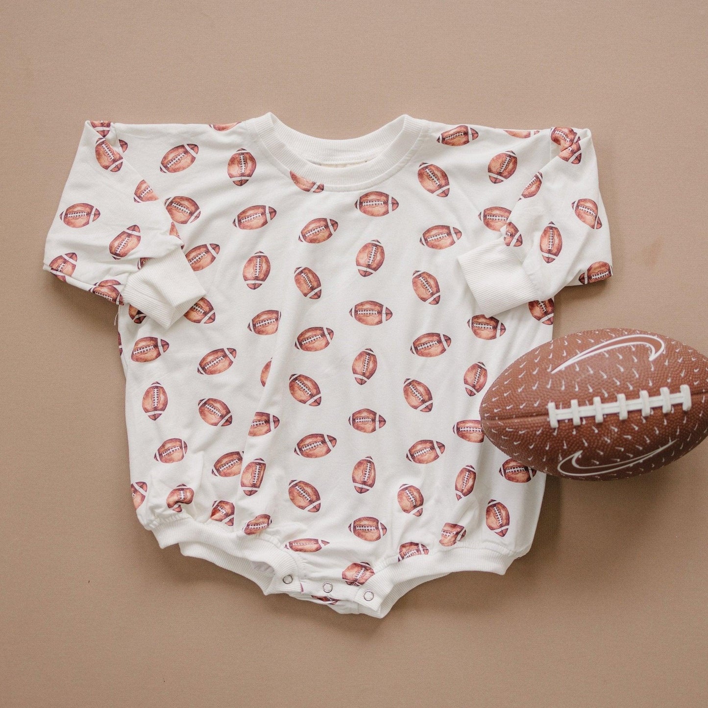 Football Print Bamboo Bubble Romper with Optional Embroidery by Little Joy Co., product view 2