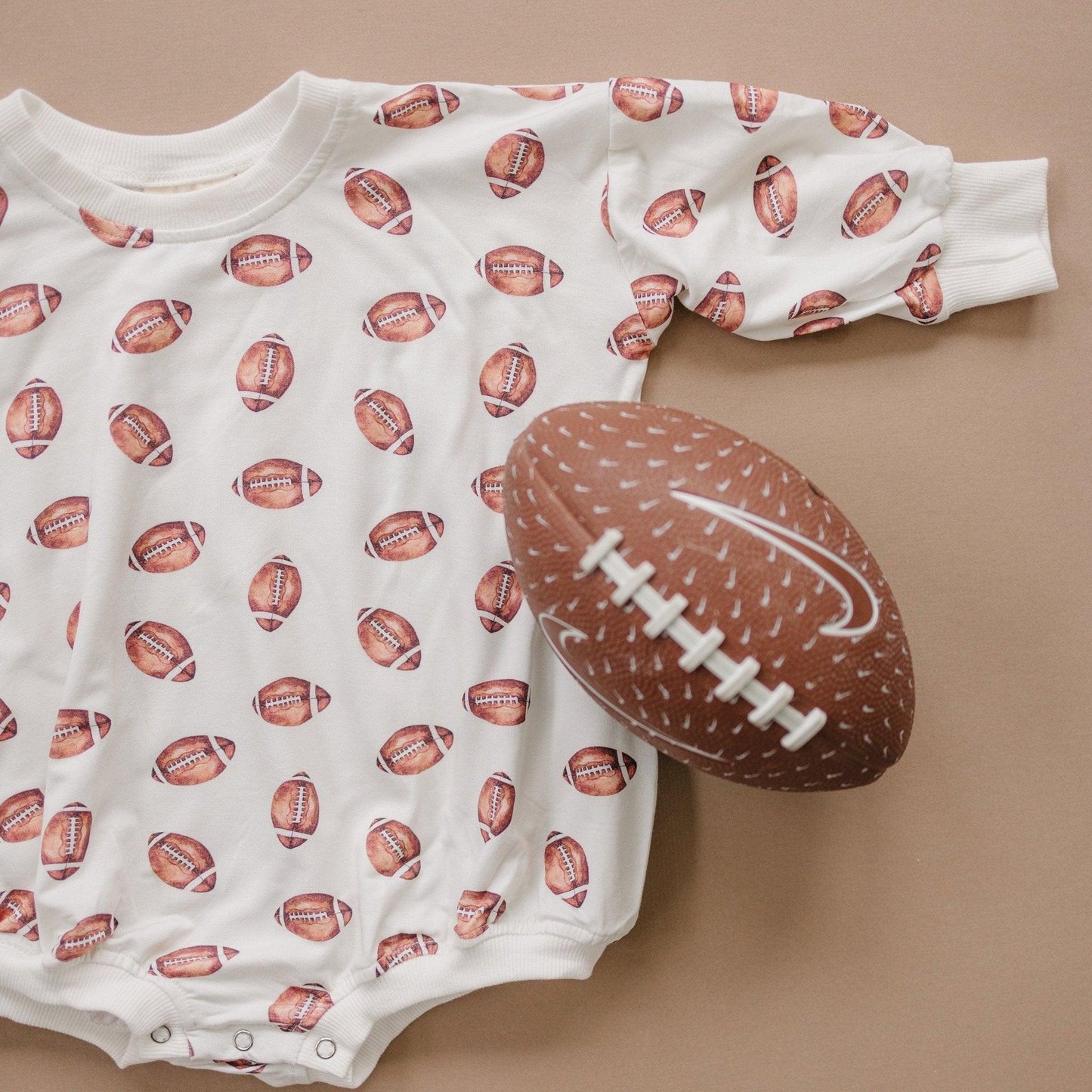 Football Print Bamboo Bubble Romper with Optional Embroidery by Little Joy Co., product view 3