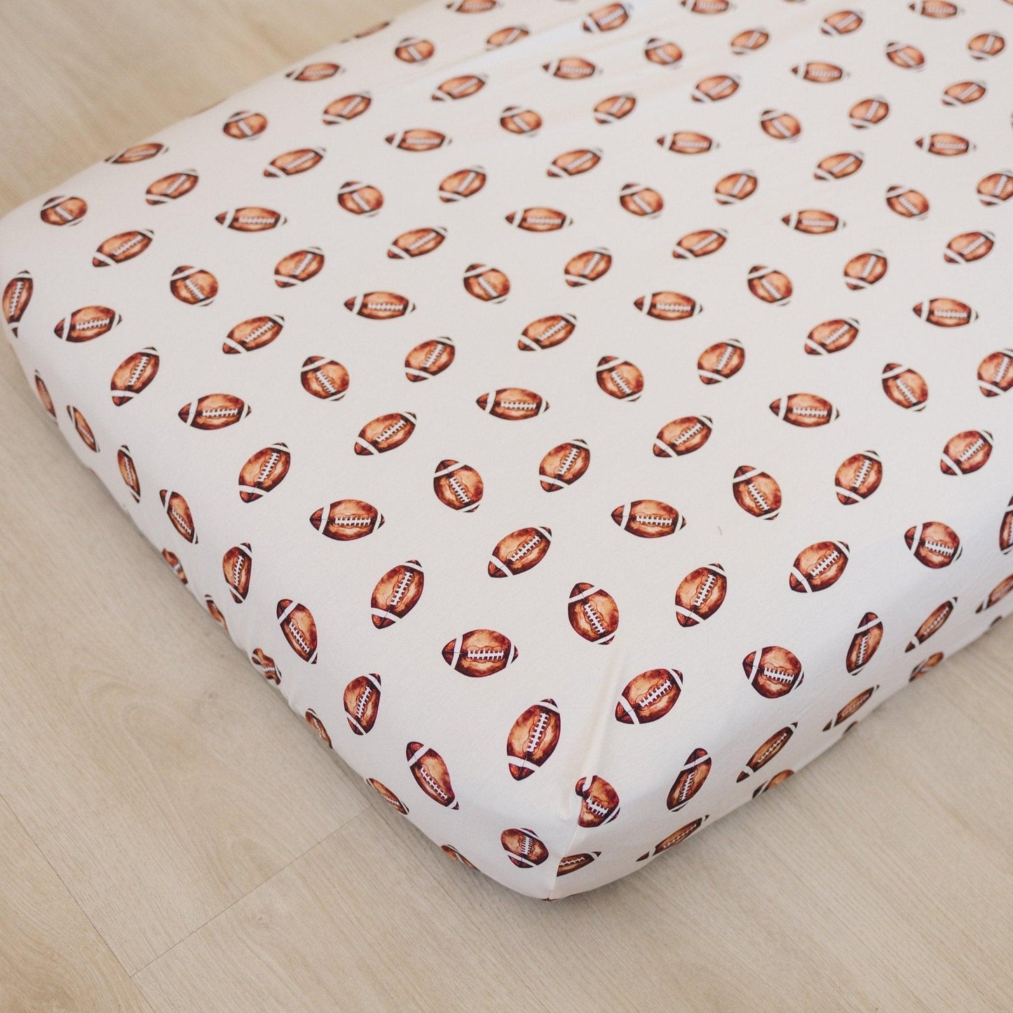 Football Print Bamboo Crib Sheet by Little Joy Co., product view 9