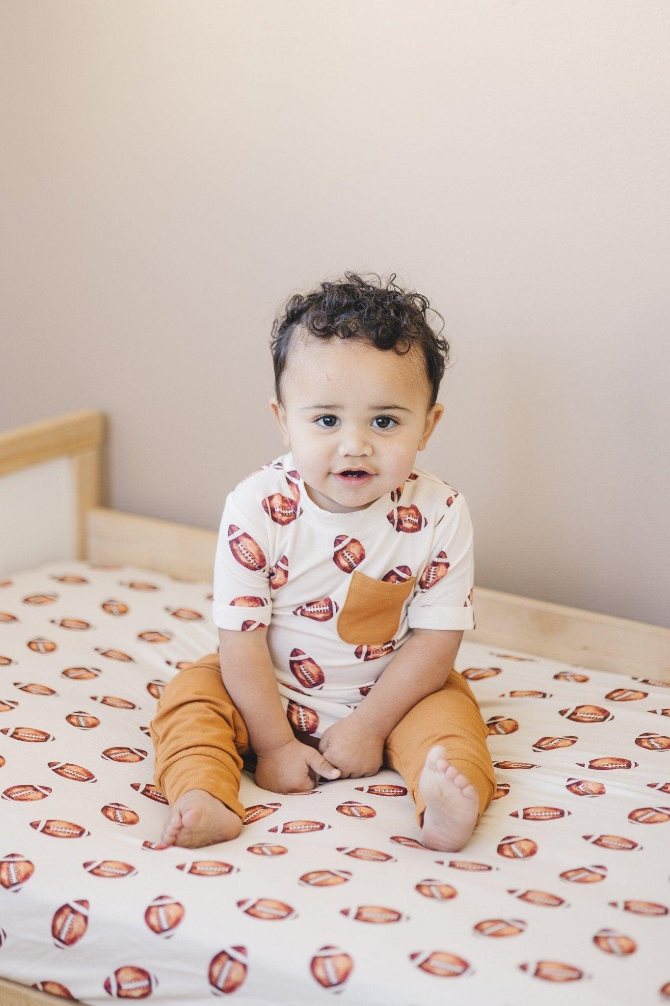 Football Print Bamboo Crib Sheet by Little Joy Co., product view 2