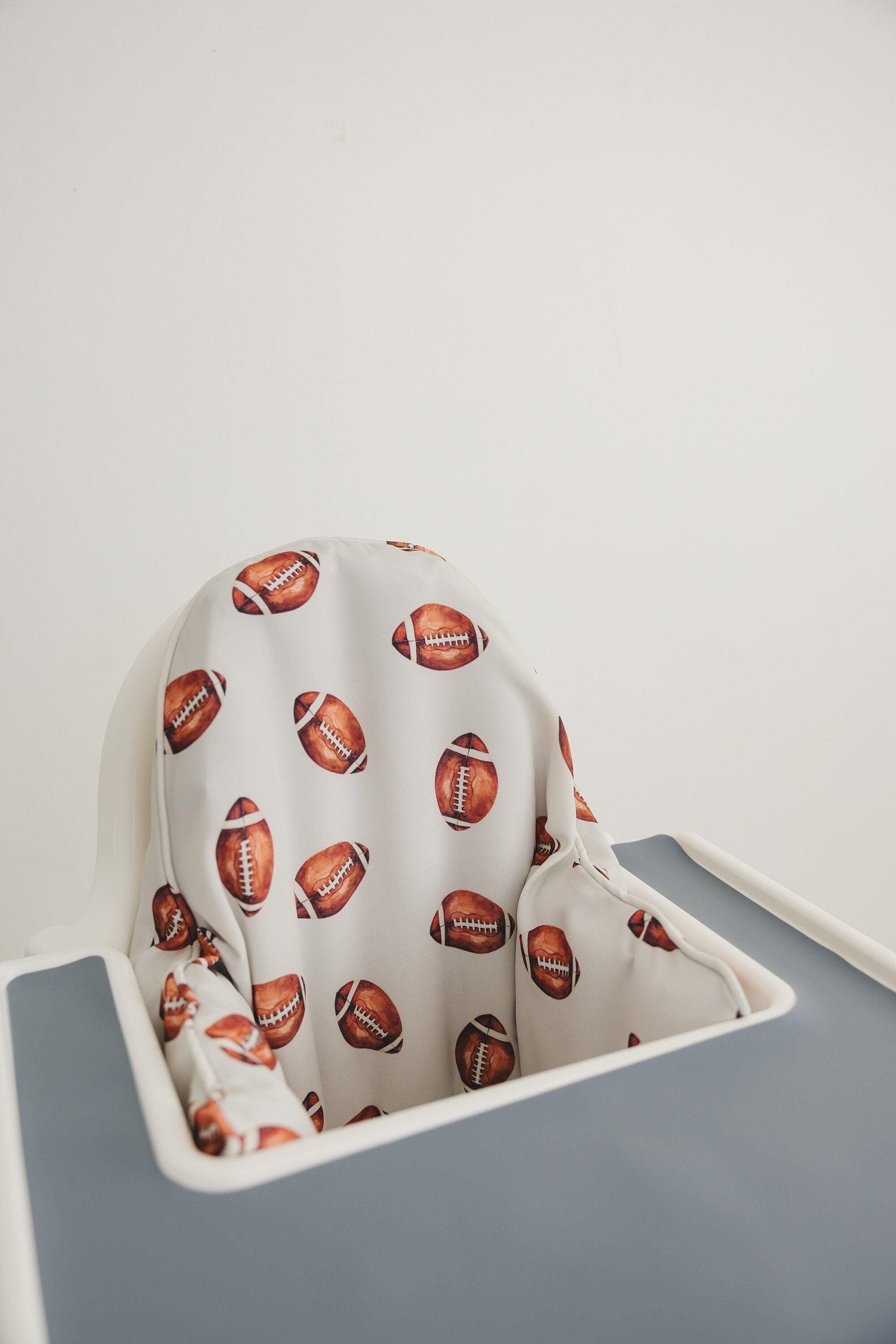 Football Print Highchair Cushion Cover for IKEA Antilop - Wipeable by Little Joy Co., product view 2