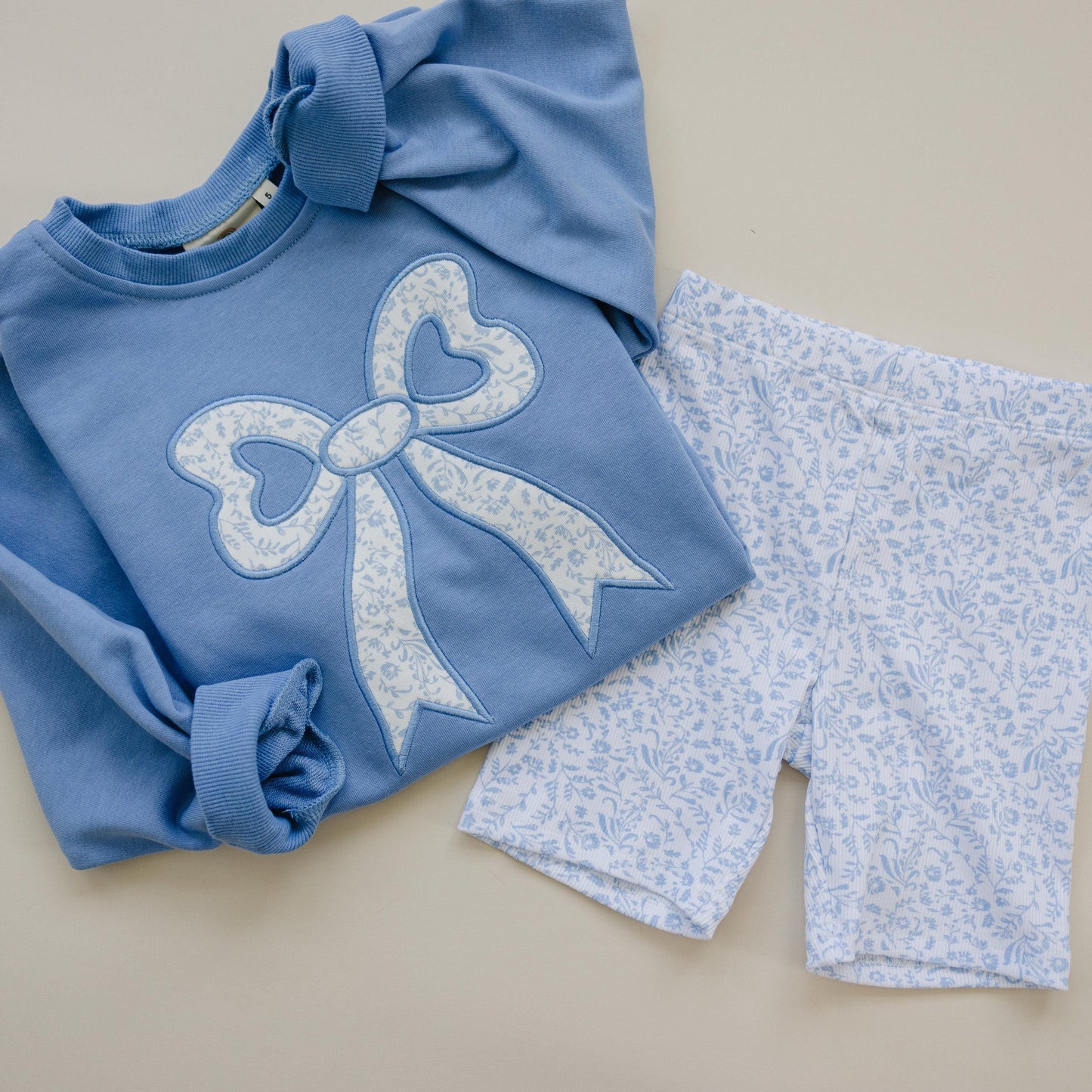Blue Toile Applique Bow: Baby Sweatshirt Romper or Crewneck by Little Joy Co., product view 3