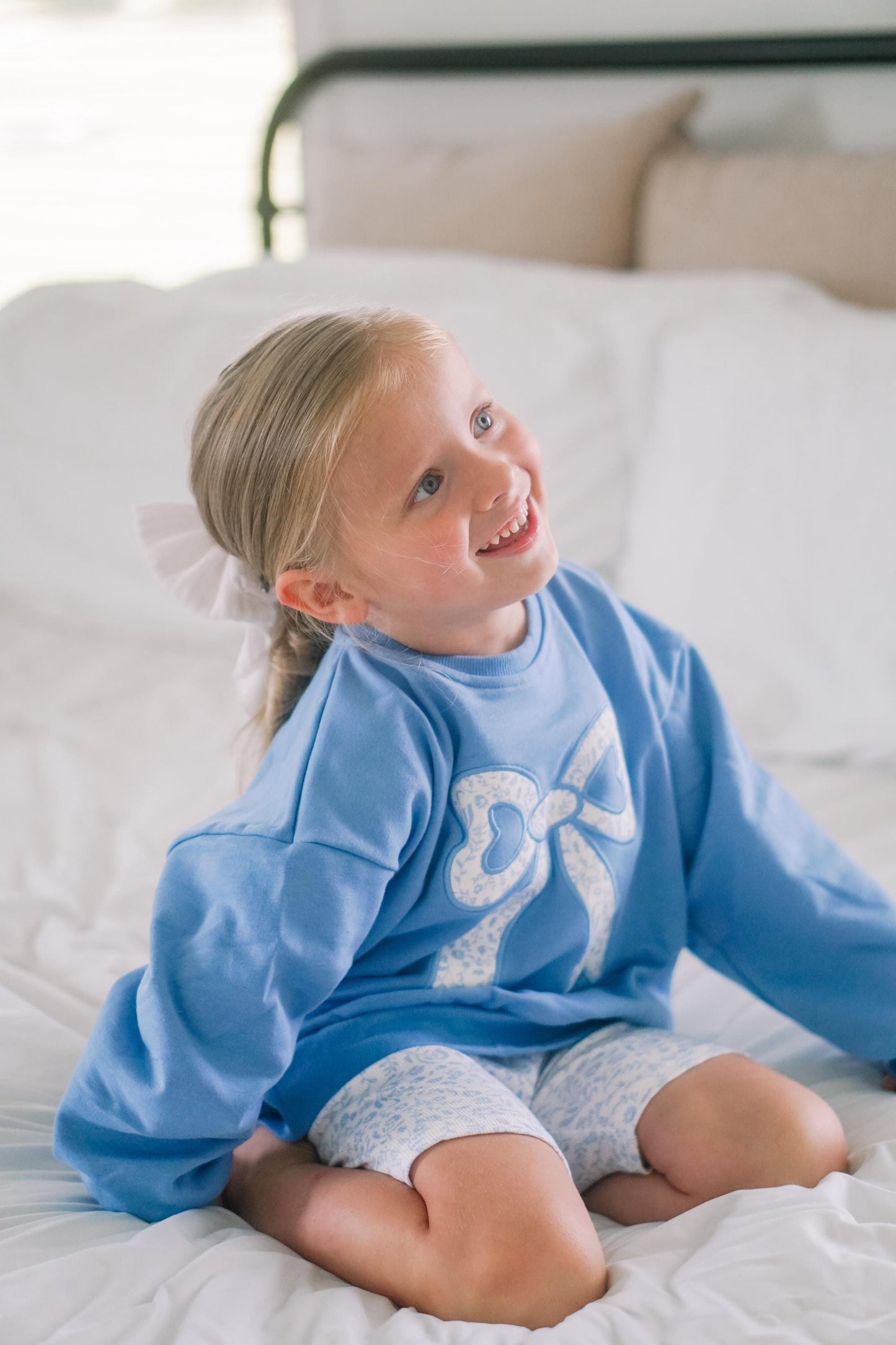 Blue Toile Applique Bow: Baby Sweatshirt Romper or Crewneck by Little Joy Co., product view 9